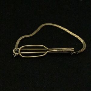 Tie bar￼ Vintage male eternity symbol, tie bar by radio